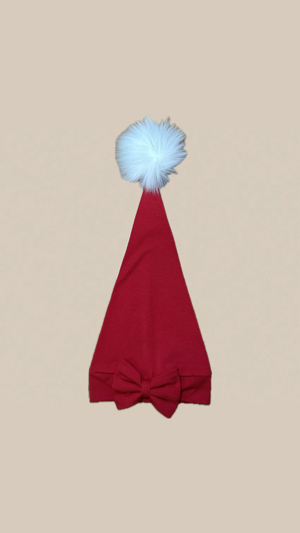 Tonttulakki, rusetilla